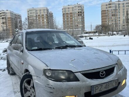 Серый Мазда 323, объемом двигателя 2 л и пробегом 300 тыс. км за 1350 $, фото 1 на Automoto.ua