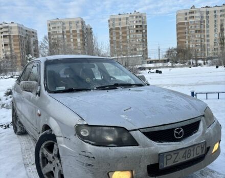 Серый Мазда 323, объемом двигателя 2 л и пробегом 300 тыс. км за 1350 $, фото 1 на Automoto.ua
