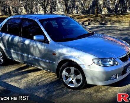 Серый Мазда 323, объемом двигателя 1.6 л и пробегом 203 тыс. км за 2950 $, фото 1 на Automoto.ua