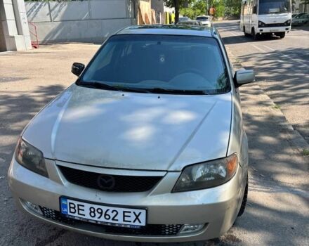 Серый Мазда 323, объемом двигателя 2 л и пробегом 230 тыс. км за 1250 $, фото 1 на Automoto.ua