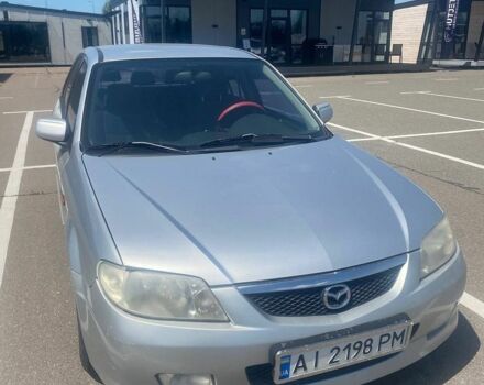 Серый Мазда 323, объемом двигателя 2 л и пробегом 284 тыс. км за 2300 $, фото 1 на Automoto.ua