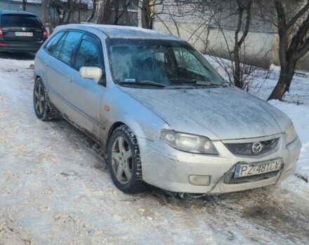 Серый Мазда 323, объемом двигателя 2 л и пробегом 300 тыс. км за 950 $, фото 1 на Automoto.ua