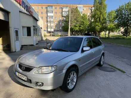 Серый Мазда 323, объемом двигателя 2 л и пробегом 400 тыс. км за 1350 $, фото 1 на Automoto.ua