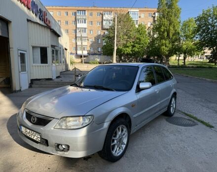 Серый Мазда 323, объемом двигателя 2 л и пробегом 400 тыс. км за 1350 $, фото 1 на Automoto.ua