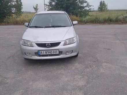 Серый Мазда 323, объемом двигателя 1.6 л и пробегом 350 тыс. км за 2700 $, фото 1 на Automoto.ua