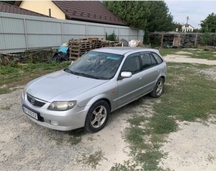 Серый Мазда 323, объемом двигателя 2 л и пробегом 300 тыс. км за 1600 $, фото 1 на Automoto.ua