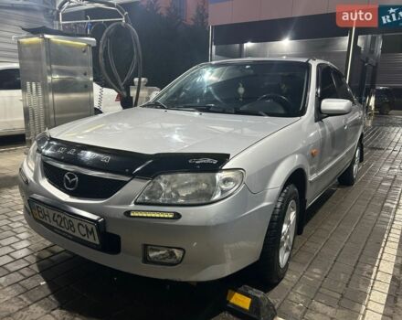 Серый Мазда 323, объемом двигателя 1.6 л и пробегом 256 тыс. км за 3350 $, фото 1 на Automoto.ua