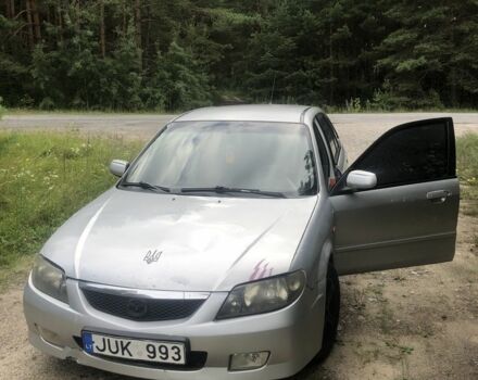 Серый Мазда 323, объемом двигателя 2 л и пробегом 320 тыс. км за 800 $, фото 1 на Automoto.ua