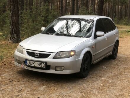 Серый Мазда 323, объемом двигателя 2 л и пробегом 358 тыс. км за 850 $, фото 1 на Automoto.ua