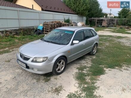Серый Мазда 323, объемом двигателя 2 л и пробегом 268 тыс. км за 1400 $, фото 1 на Automoto.ua