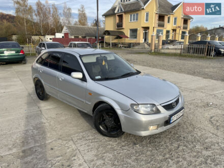 Серый Мазда 323, объемом двигателя 2 л и пробегом 305 тыс. км за 2000 $, фото 1 на Automoto.ua