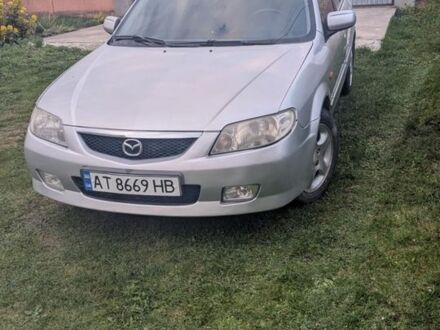 Серый Мазда 323, объемом двигателя 1.6 л и пробегом 250 тыс. км за 3100 $, фото 1 на Automoto.ua
