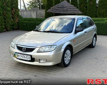 Серый Мазда 323, объемом двигателя 1.6 л и пробегом 220 тыс. км за 2450 $, фото 1 на Automoto.ua