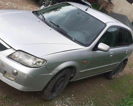 Серый Мазда 323, объемом двигателя 2 л и пробегом 230 тыс. км за 800 $, фото 1 на Automoto.ua