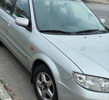 Мазда 323 2003 у Києві на Automoto.ua Сірий Мазда 323, об'ємом двигуна 1.59 л та пробігом 256 тис. км за 3600 $, фото 1 на Automoto.ua