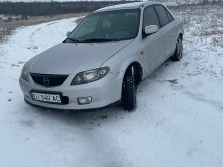 Серый Мазда 323, объемом двигателя 1.6 л и пробегом 290 тыс. км за 2300 $, фото 1 на Automoto.ua