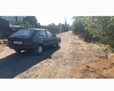 Синий Мазда 323, объемом двигателя 1.3 л и пробегом 200 тыс. км за 477 $, фото 5 на Automoto.ua