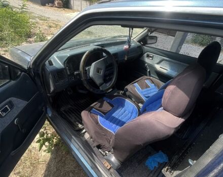 Синій Мазда 323, об'ємом двигуна 1.5 л та пробігом 300 тис. км за 1100 $, фото 2 на Automoto.ua