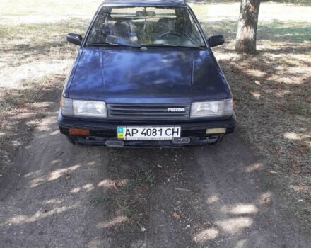 Синій Мазда 323, об'ємом двигуна 0 л та пробігом 200 тис. км за 848 $, фото 1 на Automoto.ua