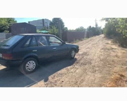 Синий Мазда 323, объемом двигателя 1.3 л и пробегом 200 тыс. км за 477 $, фото 4 на Automoto.ua