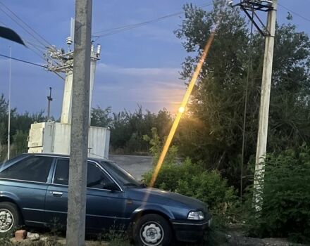 Синій Мазда 323, об'ємом двигуна 1.5 л та пробігом 300 тис. км за 1100 $, фото 3 на Automoto.ua