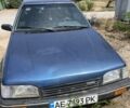 Синій Мазда 323, об'ємом двигуна 1.5 л та пробігом 300 тис. км за 1100 $, фото 1 на Automoto.ua