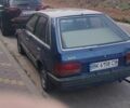 Синий Мазда 323, объемом двигателя 1.6 л и пробегом 300 тыс. км за 337 $, фото 1 на Automoto.ua