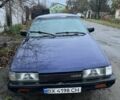 Синій Мазда 323, об'ємом двигуна 1.8 л та пробігом 200 тис. км за 350 $, фото 1 на Automoto.ua