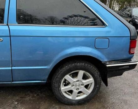 Синий Мазда 323, объемом двигателя 1.32 л и пробегом 220 тыс. км за 950 $, фото 3 на Automoto.ua