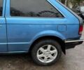 Синий Мазда 323, объемом двигателя 1.32 л и пробегом 220 тыс. км за 950 $, фото 3 на Automoto.ua