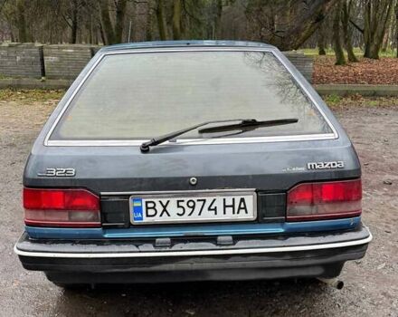 Синий Мазда 323, объемом двигателя 1.32 л и пробегом 220 тыс. км за 950 $, фото 4 на Automoto.ua