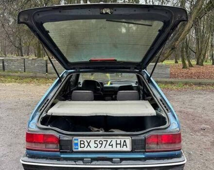 Синий Мазда 323, объемом двигателя 1.32 л и пробегом 220 тыс. км за 950 $, фото 6 на Automoto.ua