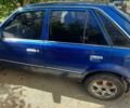 Синий Мазда 323, объемом двигателя 1.3 л и пробегом 378 тыс. км за 950 $, фото 1 на Automoto.ua