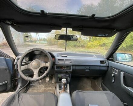 Синий Мазда 323, объемом двигателя 2 л и пробегом 465 тыс. км за 1000 $, фото 6 на Automoto.ua