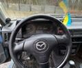 Синий Мазда 323, объемом двигателя 1.32 л и пробегом 220 тыс. км за 950 $, фото 7 на Automoto.ua
