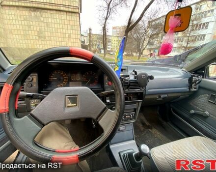 Синій Мазда 323, об'ємом двигуна 15 л та пробігом 300 тис. км за 500 $, фото 6 на Automoto.ua