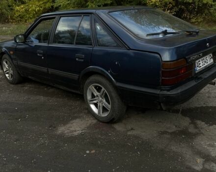 Синий Мазда 323, объемом двигателя 2 л и пробегом 465 тыс. км за 1000 $, фото 3 на Automoto.ua