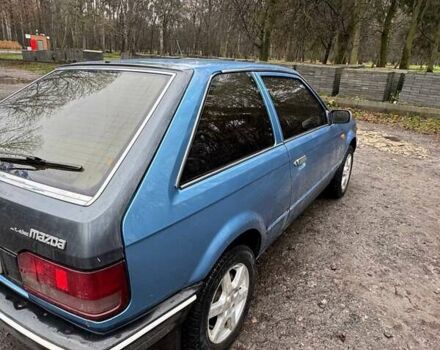 Синий Мазда 323, объемом двигателя 1.32 л и пробегом 220 тыс. км за 950 $, фото 10 на Automoto.ua