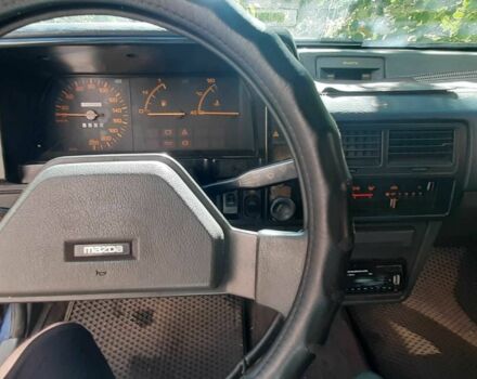 Синий Мазда 323, объемом двигателя 1.3 л и пробегом 378 тыс. км за 950 $, фото 6 на Automoto.ua