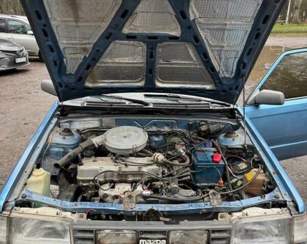 Синий Мазда 323, объемом двигателя 1.32 л и пробегом 220 тыс. км за 950 $, фото 13 на Automoto.ua
