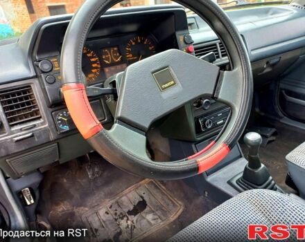 Синій Мазда 323, об'ємом двигуна 1.5 л та пробігом 254 тис. км за 530 $, фото 9 на Automoto.ua