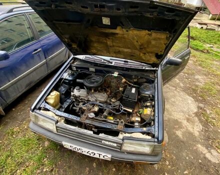 Синій Мазда 323, об'ємом двигуна 15 л та пробігом 300 тис. км за 500 $, фото 9 на Automoto.ua