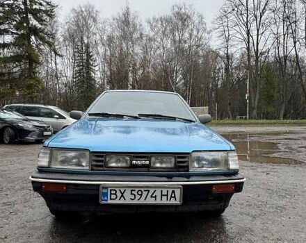 Синий Мазда 323, объемом двигателя 1.32 л и пробегом 220 тыс. км за 950 $, фото 2 на Automoto.ua