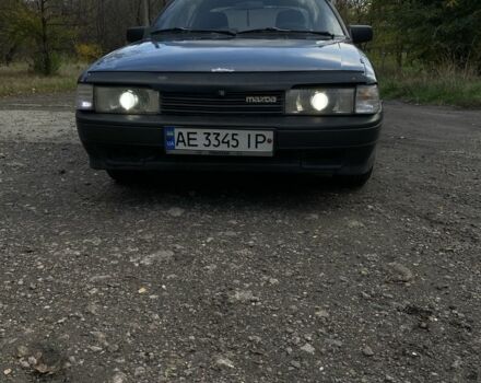 Синий Мазда 323, объемом двигателя 2 л и пробегом 465 тыс. км за 1000 $, фото 4 на Automoto.ua