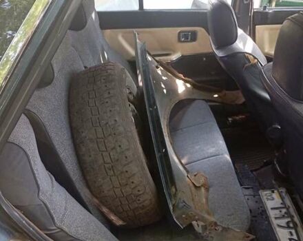 Синий Мазда 323, объемом двигателя 6 л и пробегом 330 тыс. км за 384 $, фото 6 на Automoto.ua