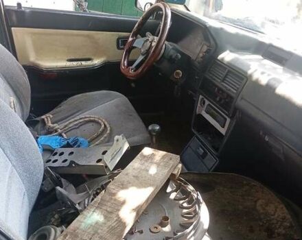 Синий Мазда 323, объемом двигателя 6 л и пробегом 330 тыс. км за 384 $, фото 5 на Automoto.ua