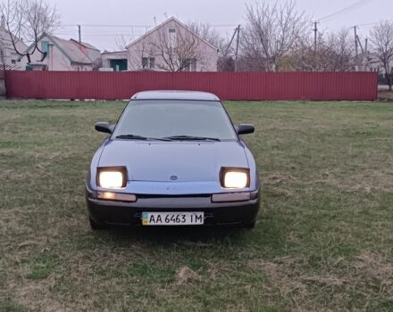 Синий Мазда 323, объемом двигателя 1.6 л и пробегом 260 тыс. км за 832 $, фото 3 на Automoto.ua