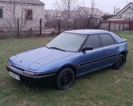 Синий Мазда 323, объемом двигателя 1.6 л и пробегом 260 тыс. км за 832 $, фото 1 на Automoto.ua