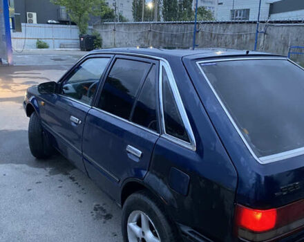 Синий Мазда 323, объемом двигателя 1.5 л и пробегом 505 тыс. км за 650 $, фото 3 на Automoto.ua
