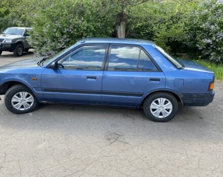 Синий Мазда 323, объемом двигателя 1.3 л и пробегом 600 тыс. км за 950 $, фото 1 на Automoto.ua